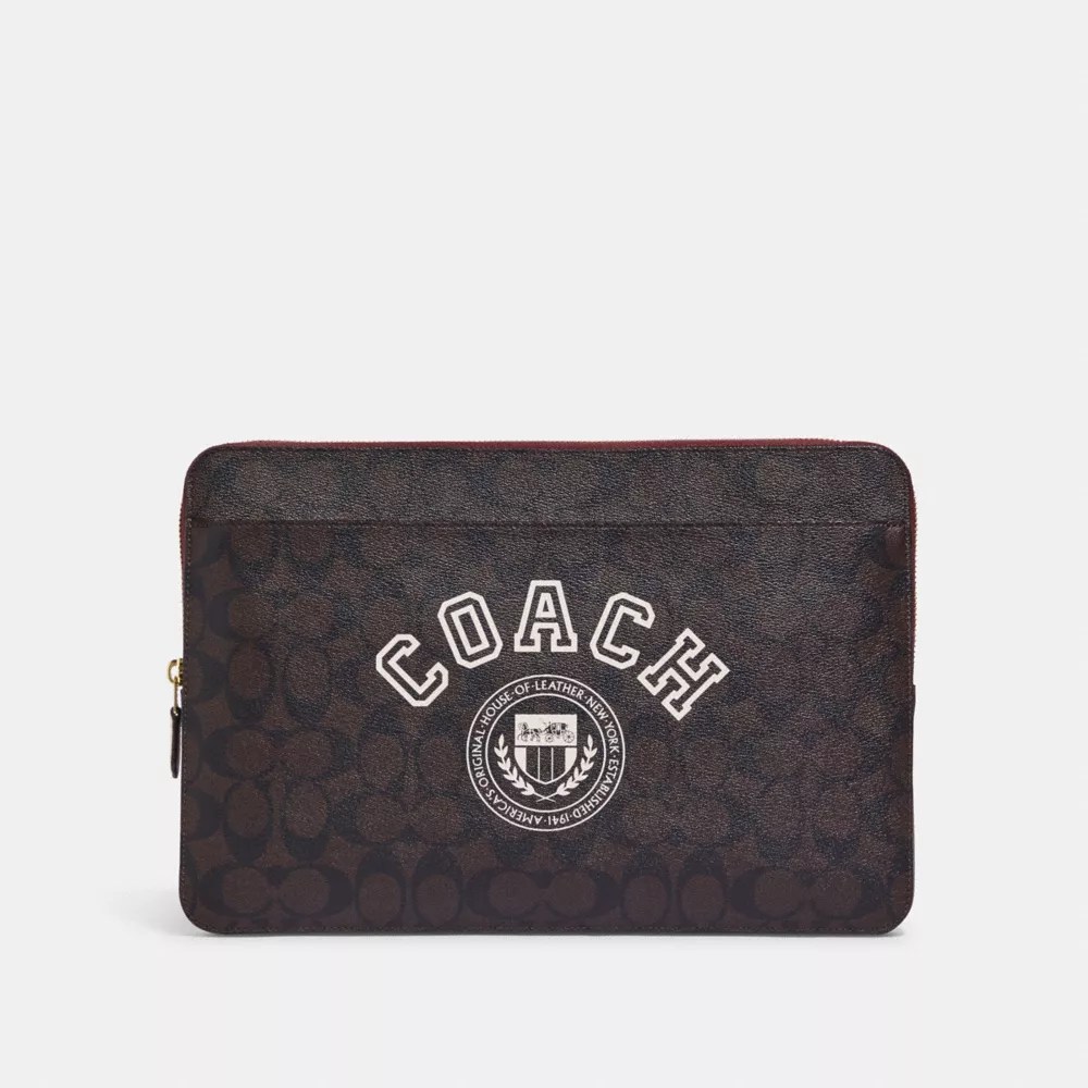 COACH® Outlet Laptop Sleeve In Signature Canvas With Coach Varsity