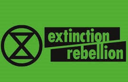 Xr merupakan kelomok kampanye lingkungan yang memiliki logo jam pasir . Extinction Rebellion - Coal Action Network Aotearoa