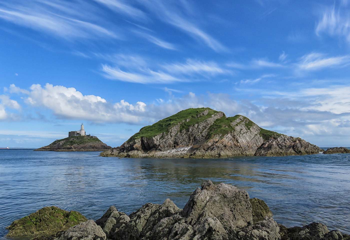 Mumbles Lighthouse in Swansea Bay and The Gower