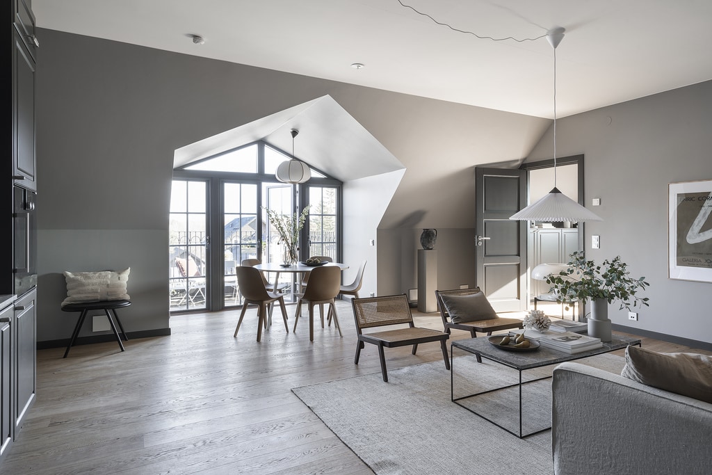 Grey walls in a loft apartment with a grey kitchen COCO LAPINE