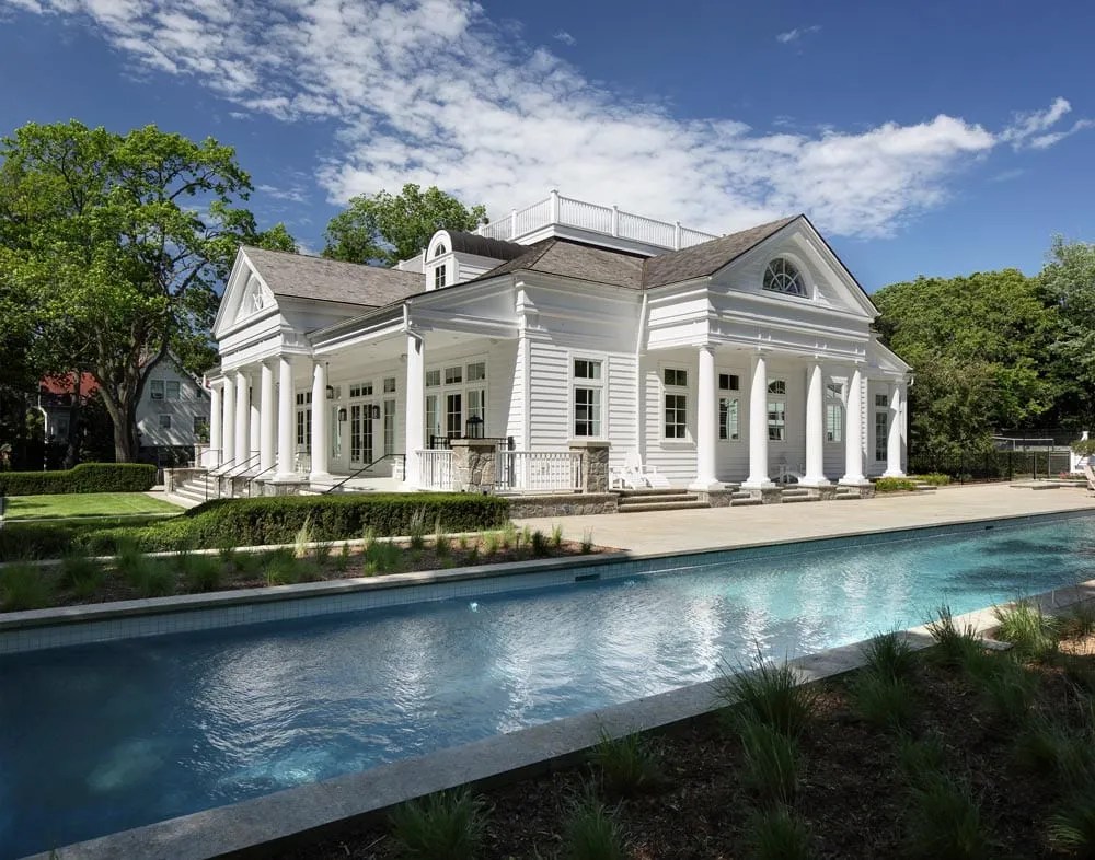 "The White Retreat" by Custom Lake Home Builder Colby
