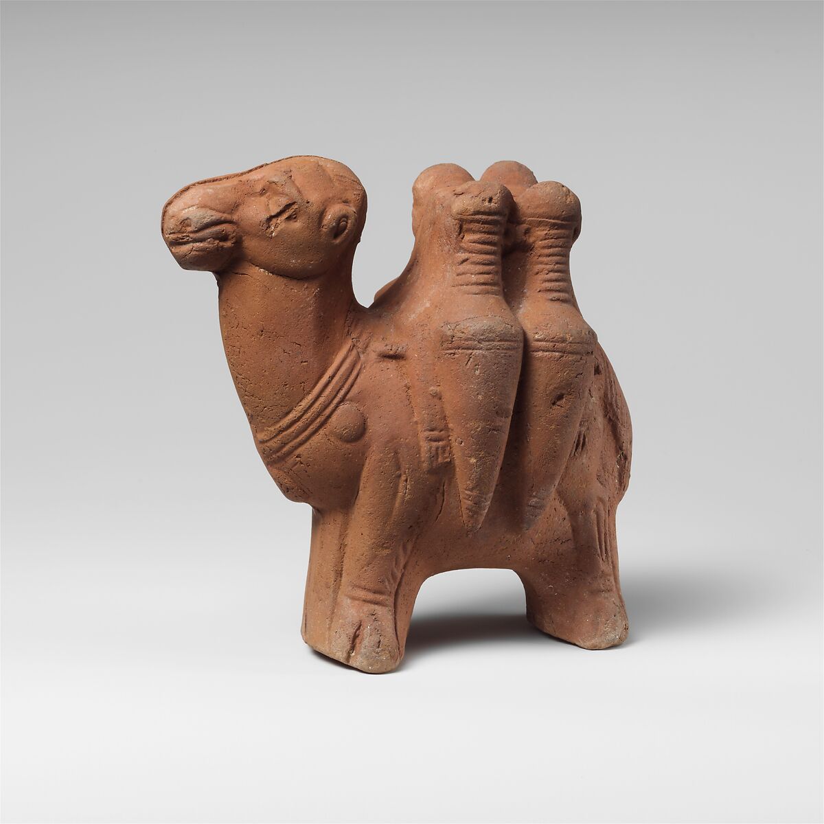 Terracotta figurine of a camel carrying transport amphorae Roman