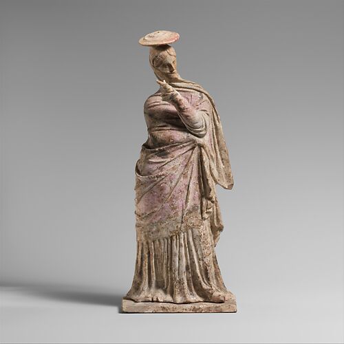 Terracotta statuette of a standing woman Greek, Boeotian Classical
