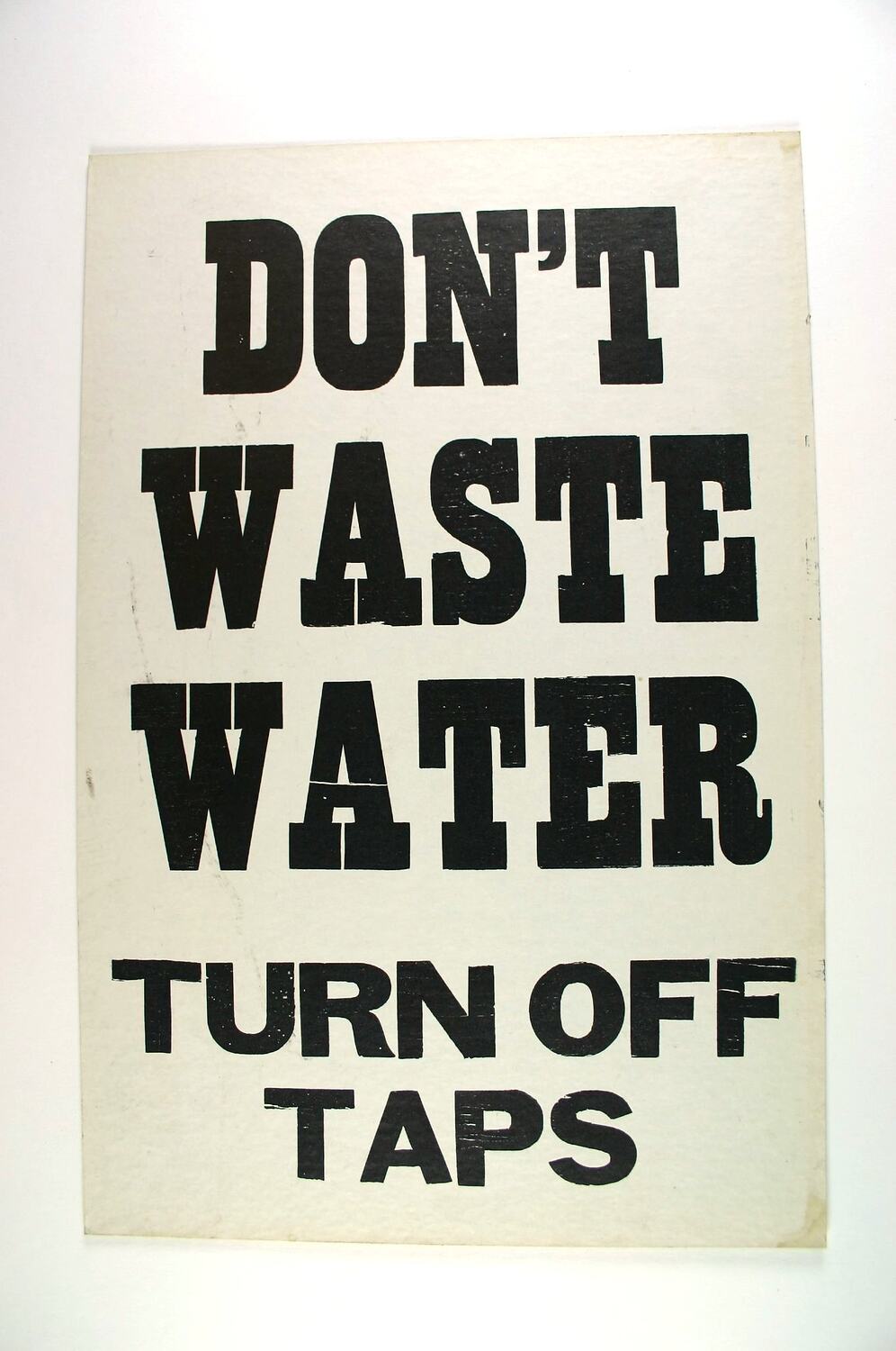 Sign 'Don't Waste Water', Newmarket Saleyards, Newmarket, circa 1967