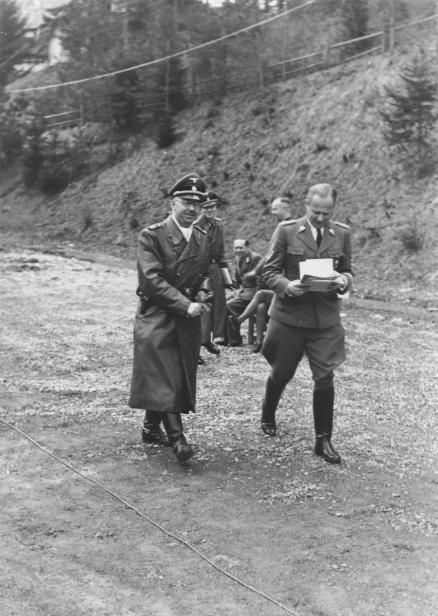 Taken on his birthday, ReichsfuehrerSS Heinrich Himmler converses with