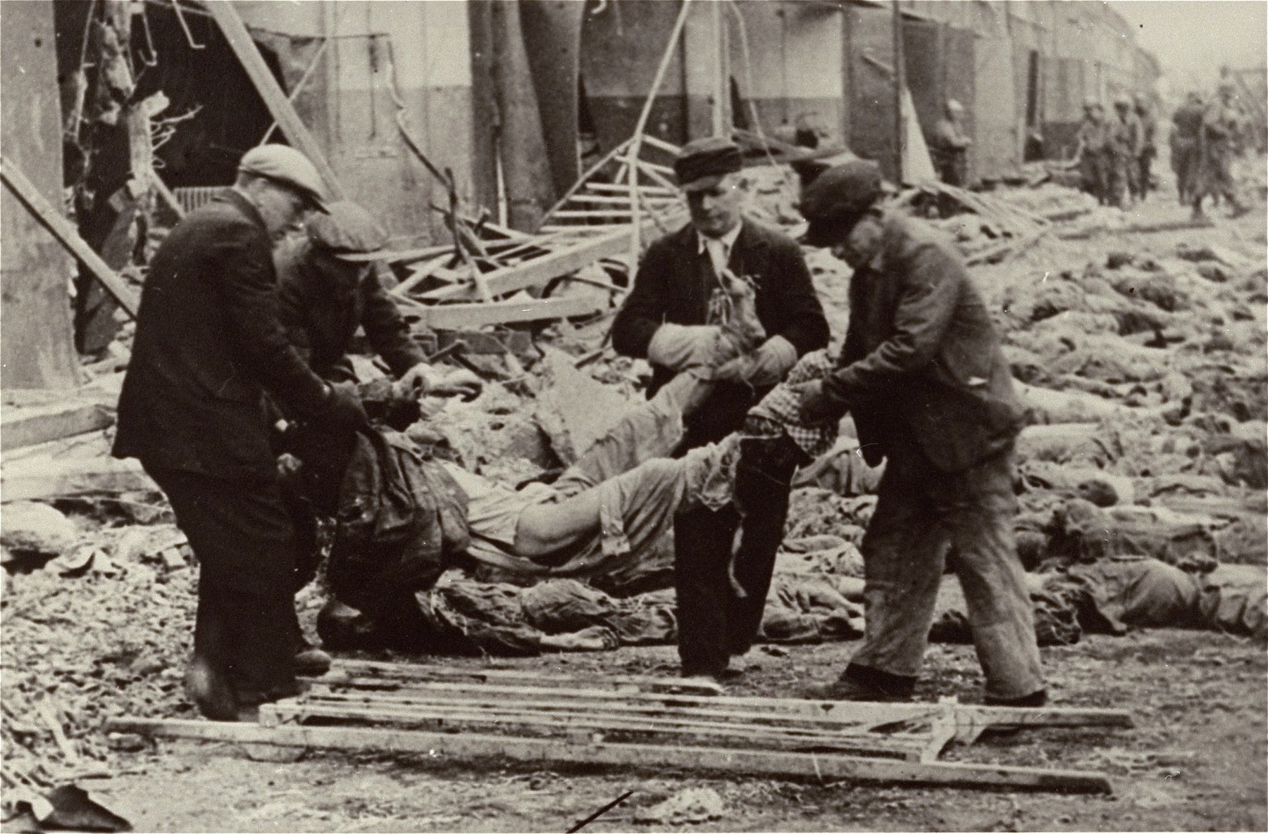 German civilians conscripted by the U.S. Army to clean the grounds of