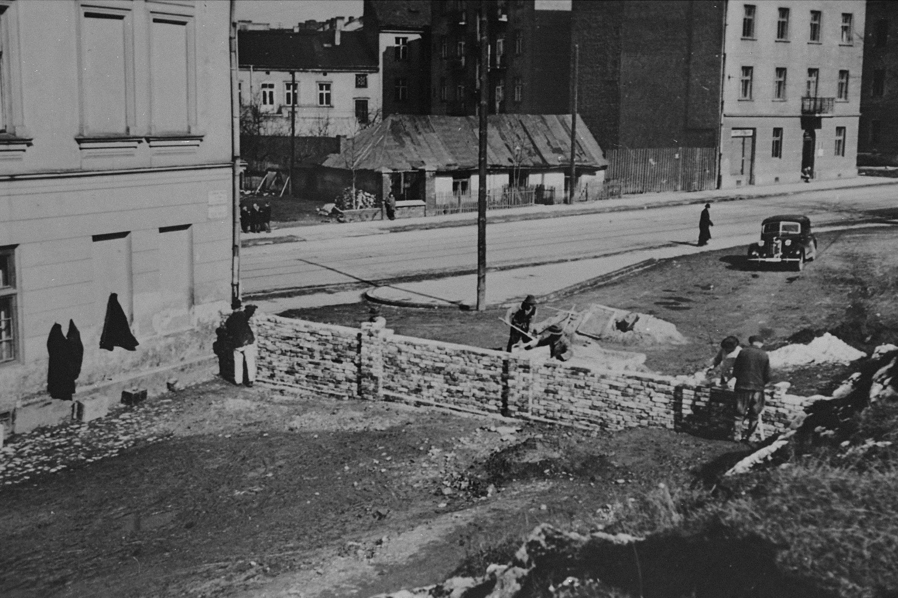 Jews at forced labor constructing the wall around the Krakow ghetto