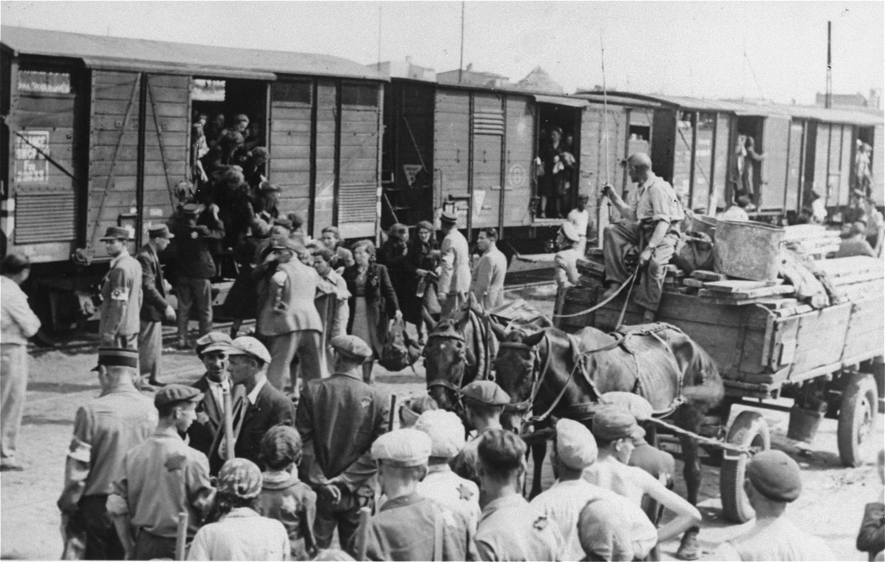 Jews from the Lodz ghetto board deportation trains for the Chelmno