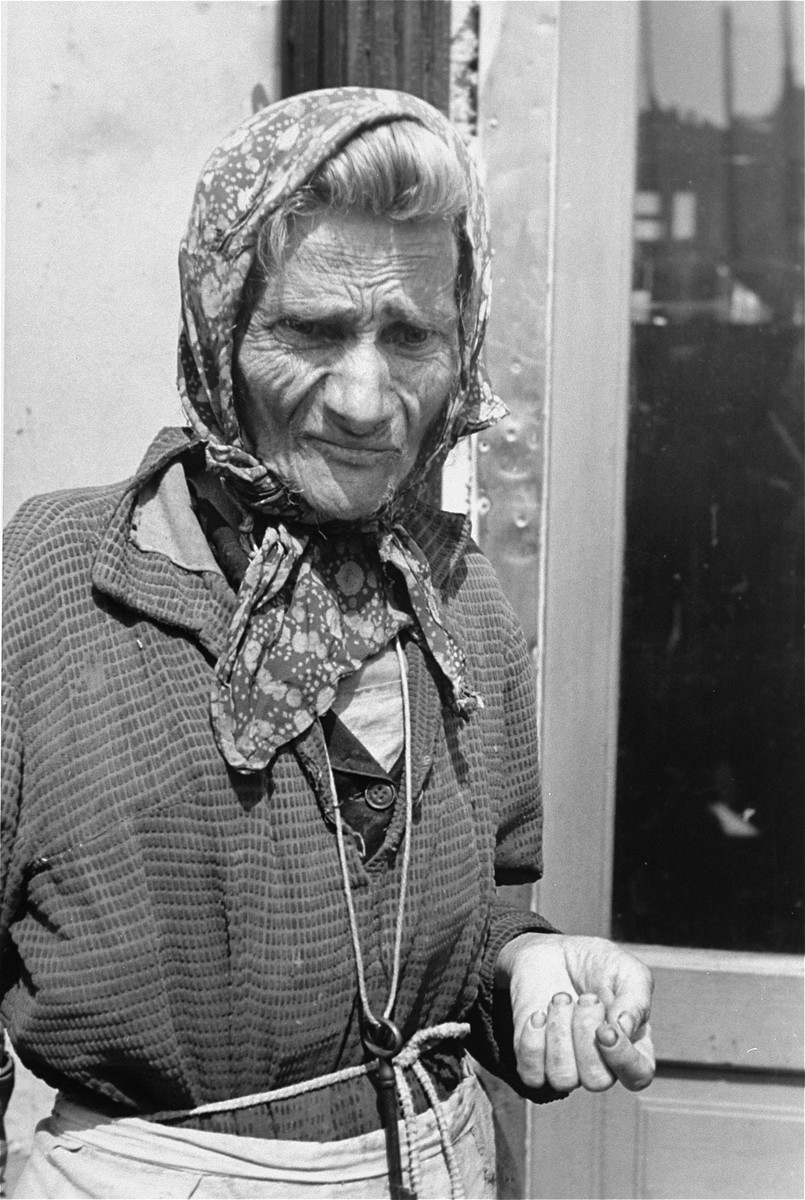 Portrait of an elderly Jewish woman wearing a head scarf in the Warsaw