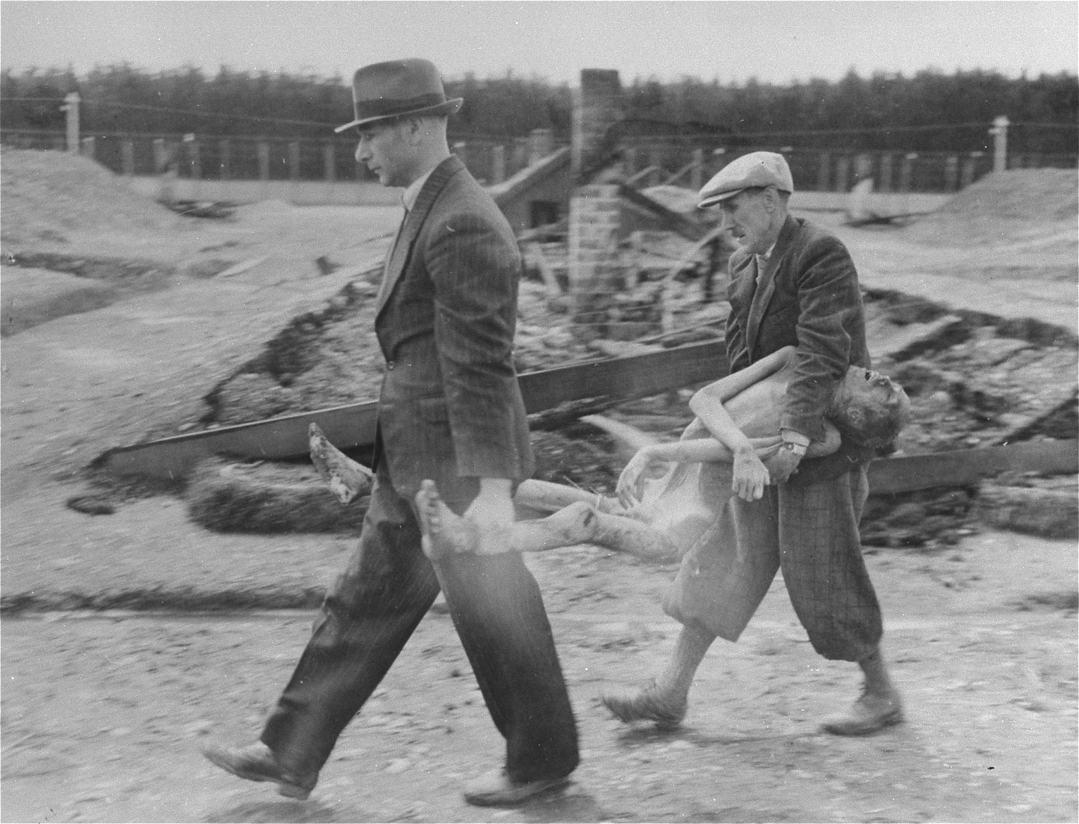 German civilians from the town of Hurlach are forced to carry corpses