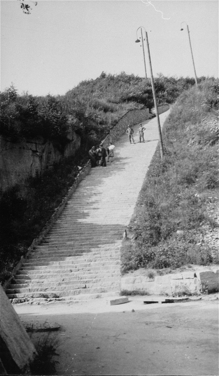 American soldiers and survivors on the stone "stairs of death