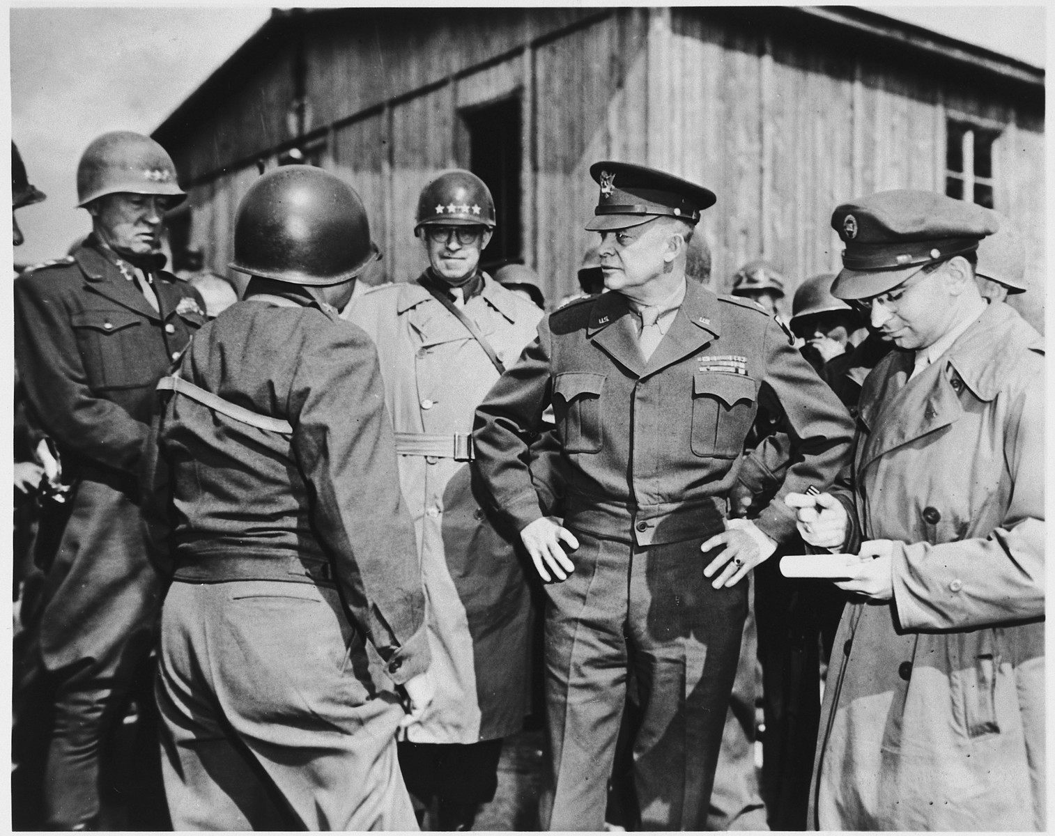 Highranking U.S. Army officers inspect the newly liberated Ohrdruf