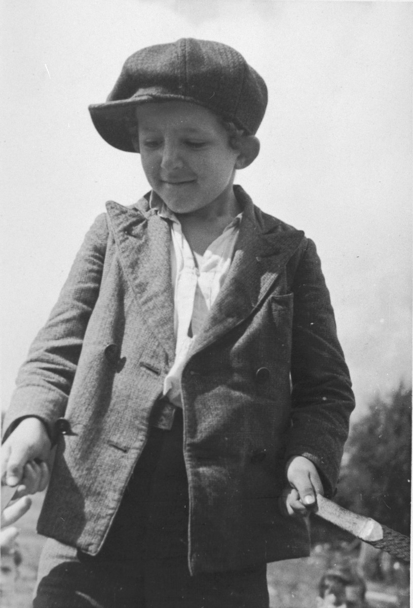 Portrait of a little Jewish boy from Germany at a Kinderlager [children