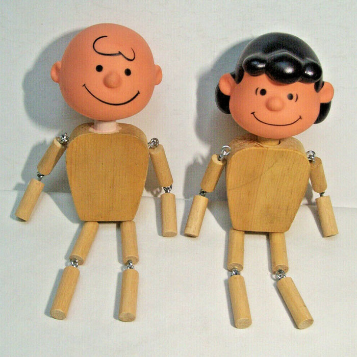 Lucy and Charlie Brown Wooden Dolls - CollectPeanuts.com