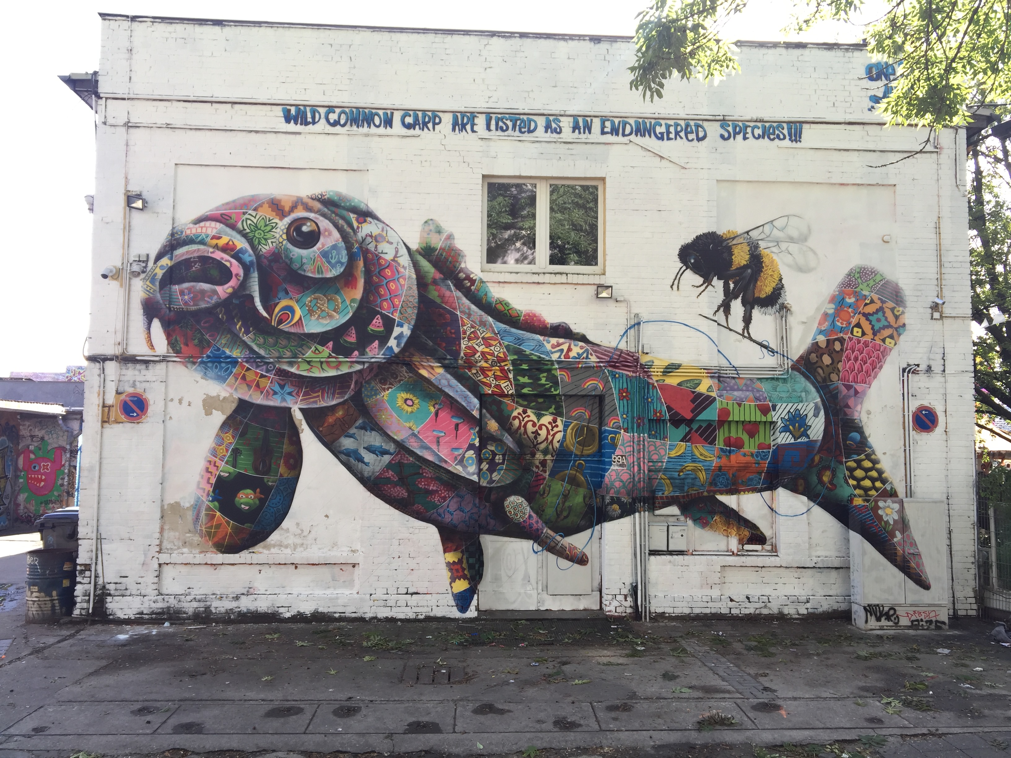 Street Artist Highlights Mass Extinction & Climate Change Louis Masai