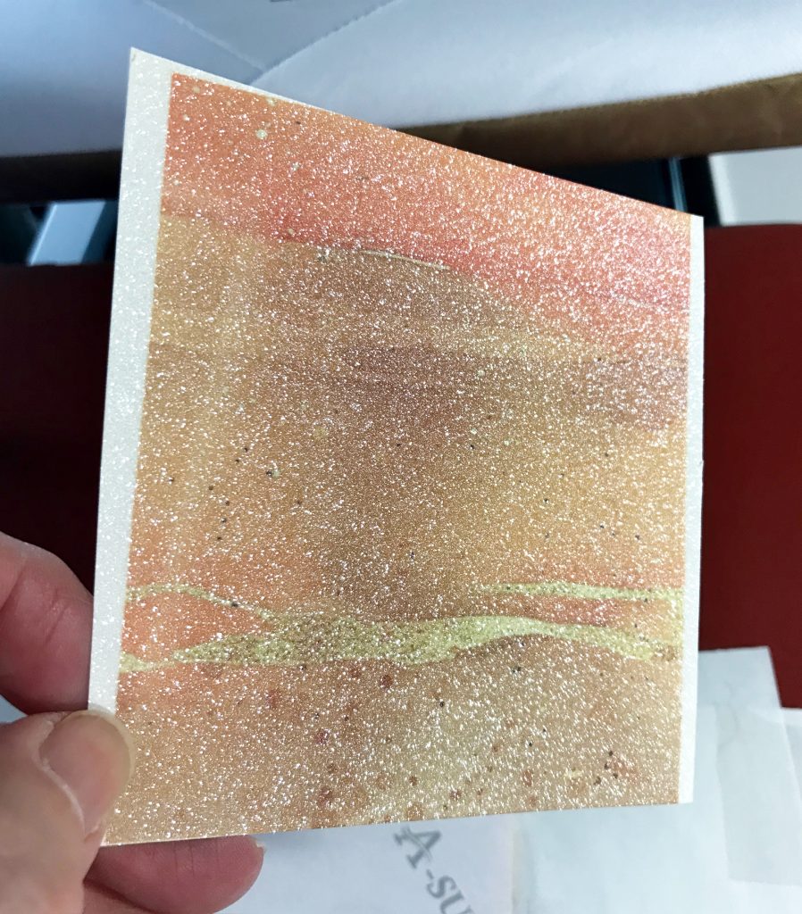 Photo of a perfectly sublimated piece of glitter card for today's Happy Spring Butterfly Card post.