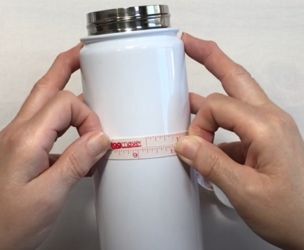 Photo showing the width measurement of the Make Market water bottle used in today’s project. 
