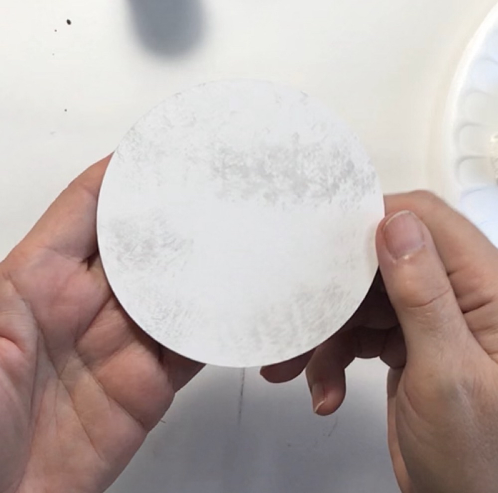 Photo showing the "moon" cut from cardstock and painted with a little bit of Lost Shadow Distress Paint.