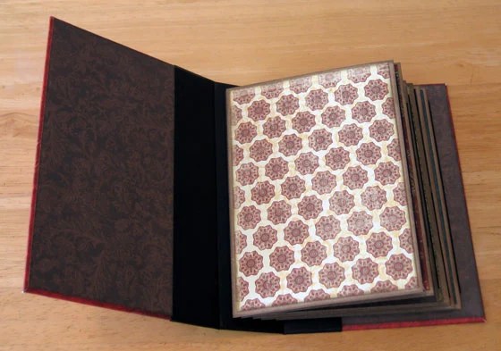 The inside front cover and first page of today's project featuring the stack the deck binding system. 
