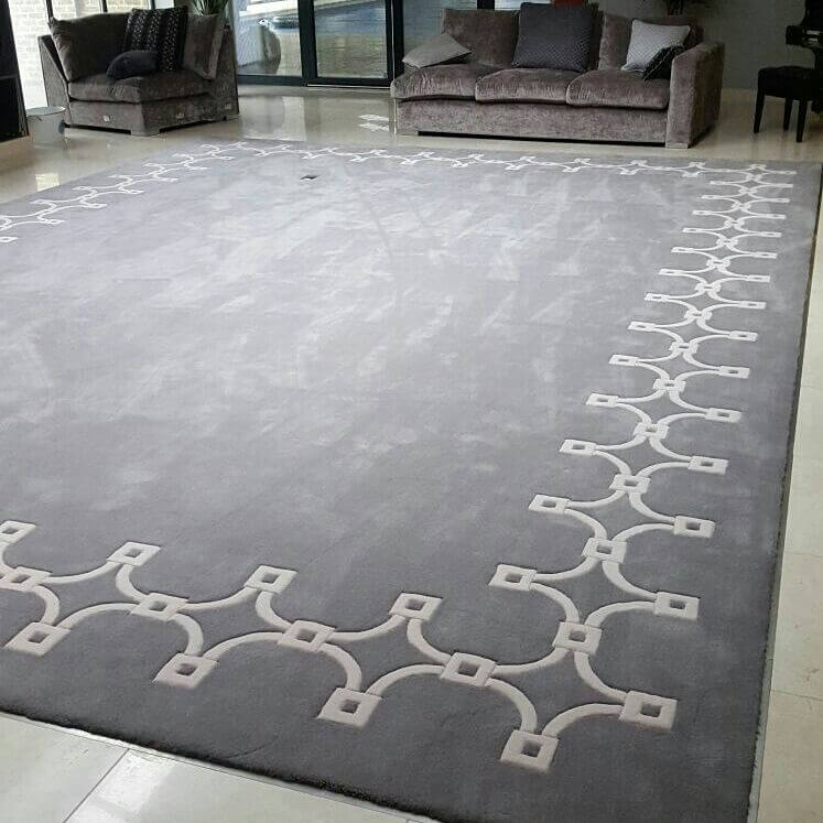 Bespoke rugs. Plain and Bordered Rugs by Colourmatched Carpets
