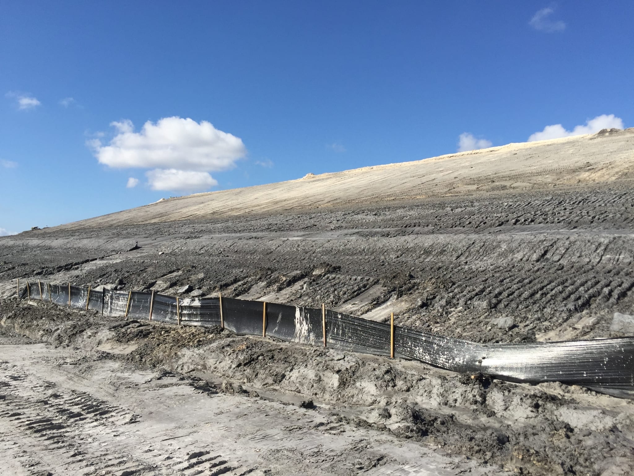 Slope Closure Project Preparing for Liner Installation COMANCO