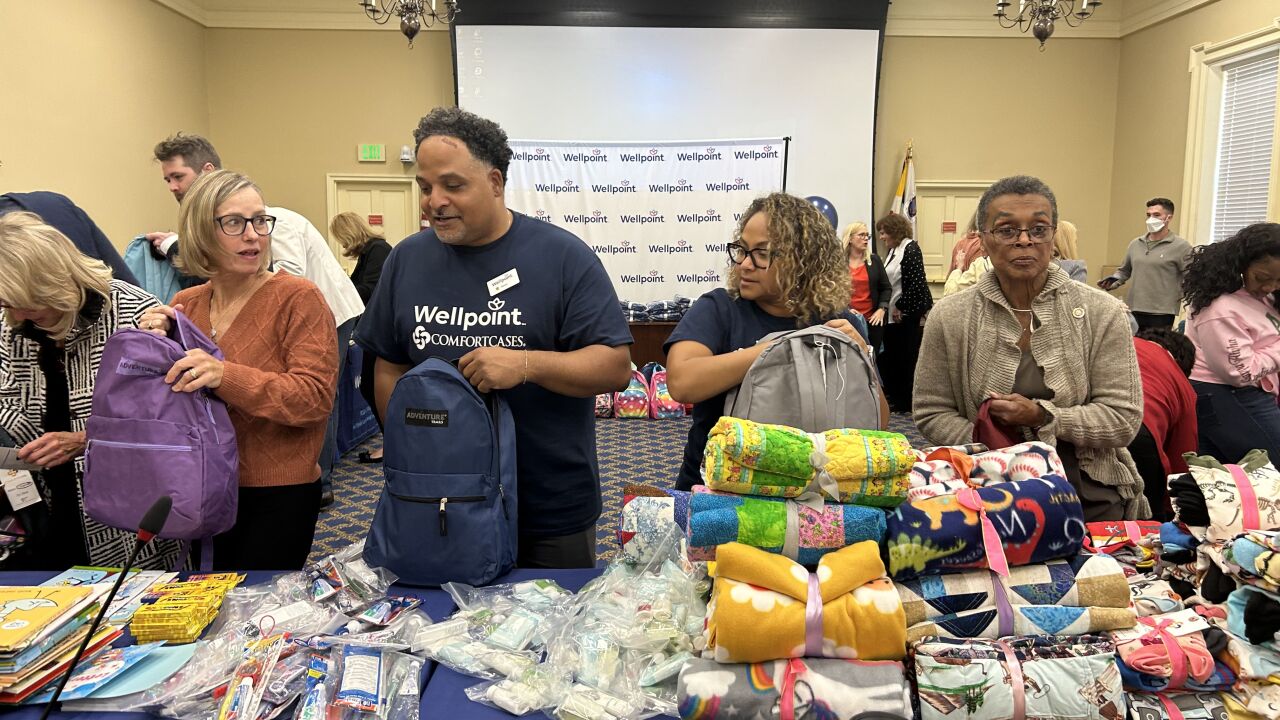 State leaders help pack 250 backpacks to support children entering