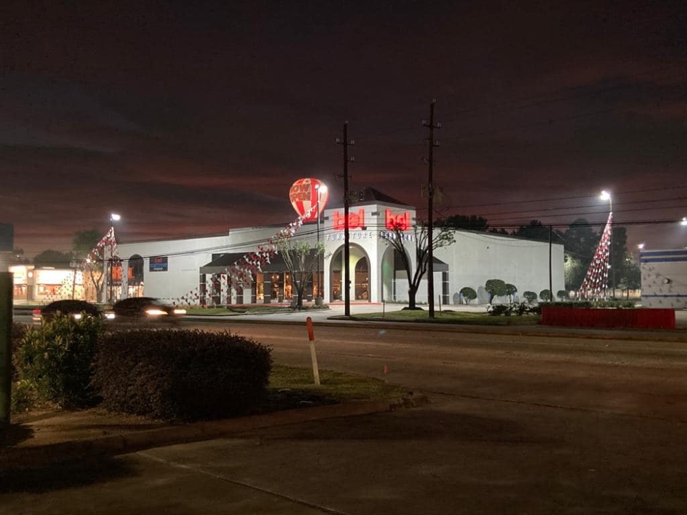 Bel Furniture celebrates grand opening of 20th location with Champions