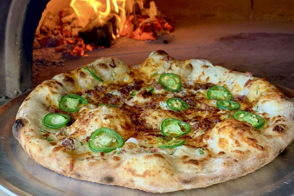 Find woodfired pizza, hidden speakeasy at Sauced Up in Magnolia