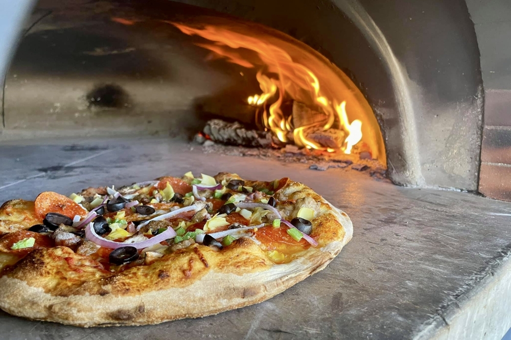 Find woodfired pizza, hidden speakeasy at Sauced Up in Magnolia