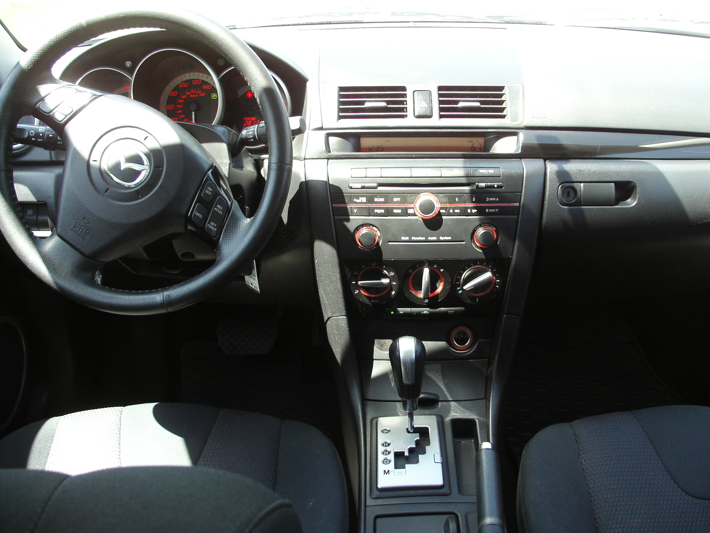 2009 Mazda 3 sport hatchback 2.3L - CoMoMotors