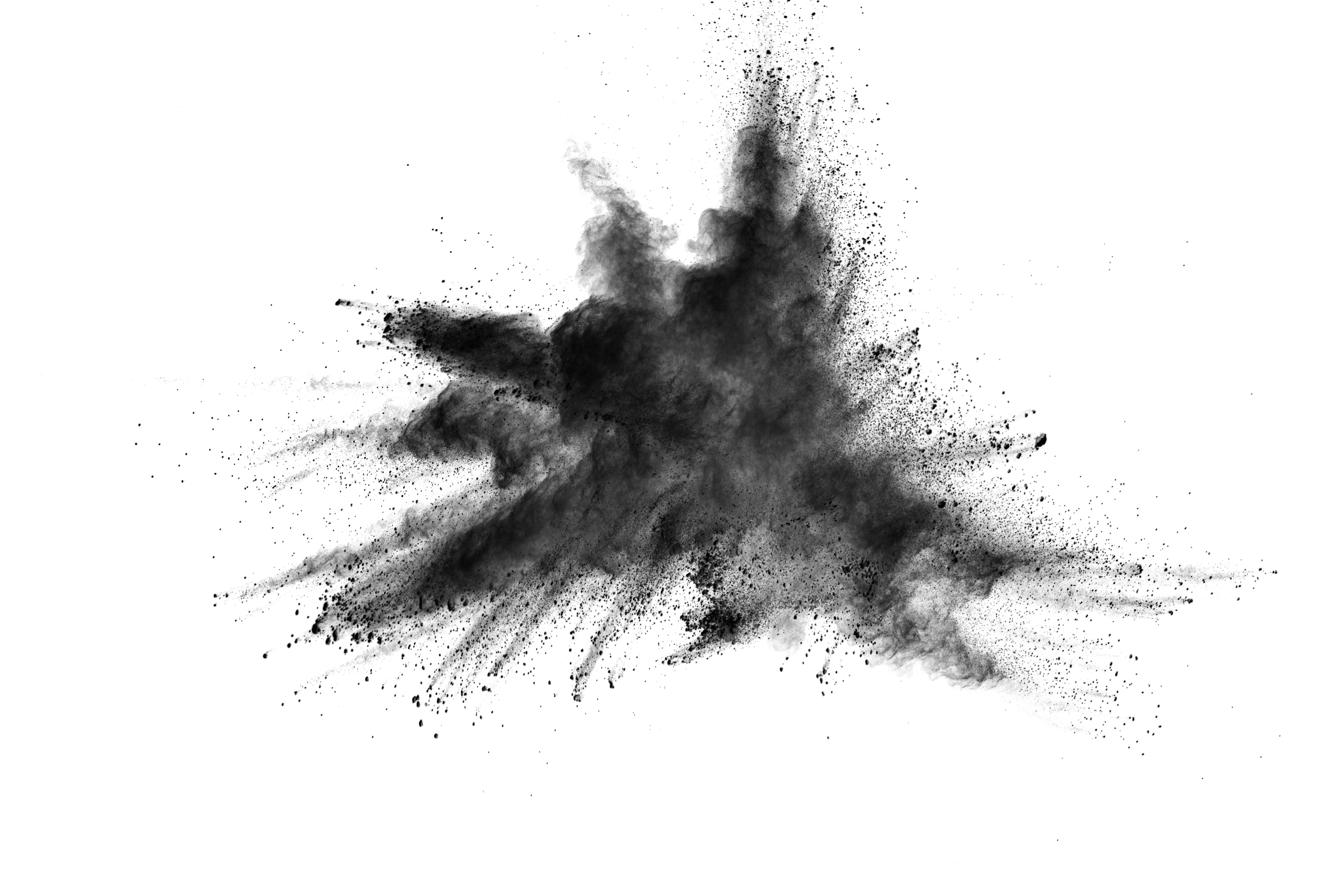 Black powder explosion. Closeup of black dust particles explode