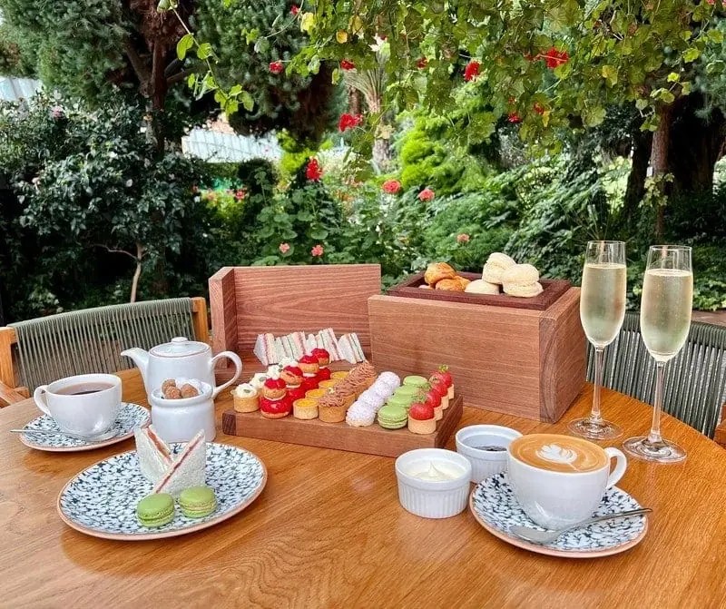 Have a festive afternoon tea set in a garden at Flower Dome's cafe