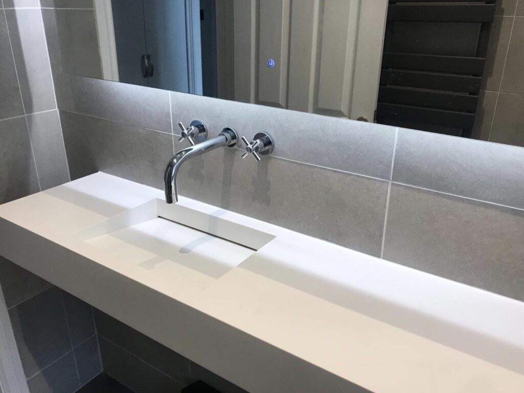 Why Corian® Makes the Best Vanity Tops Construction How