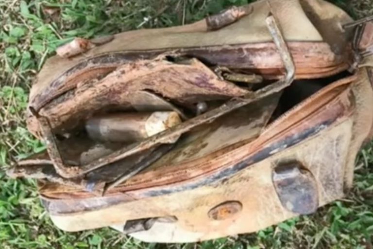 Boy calls the police after fishing an old bag out of the water and