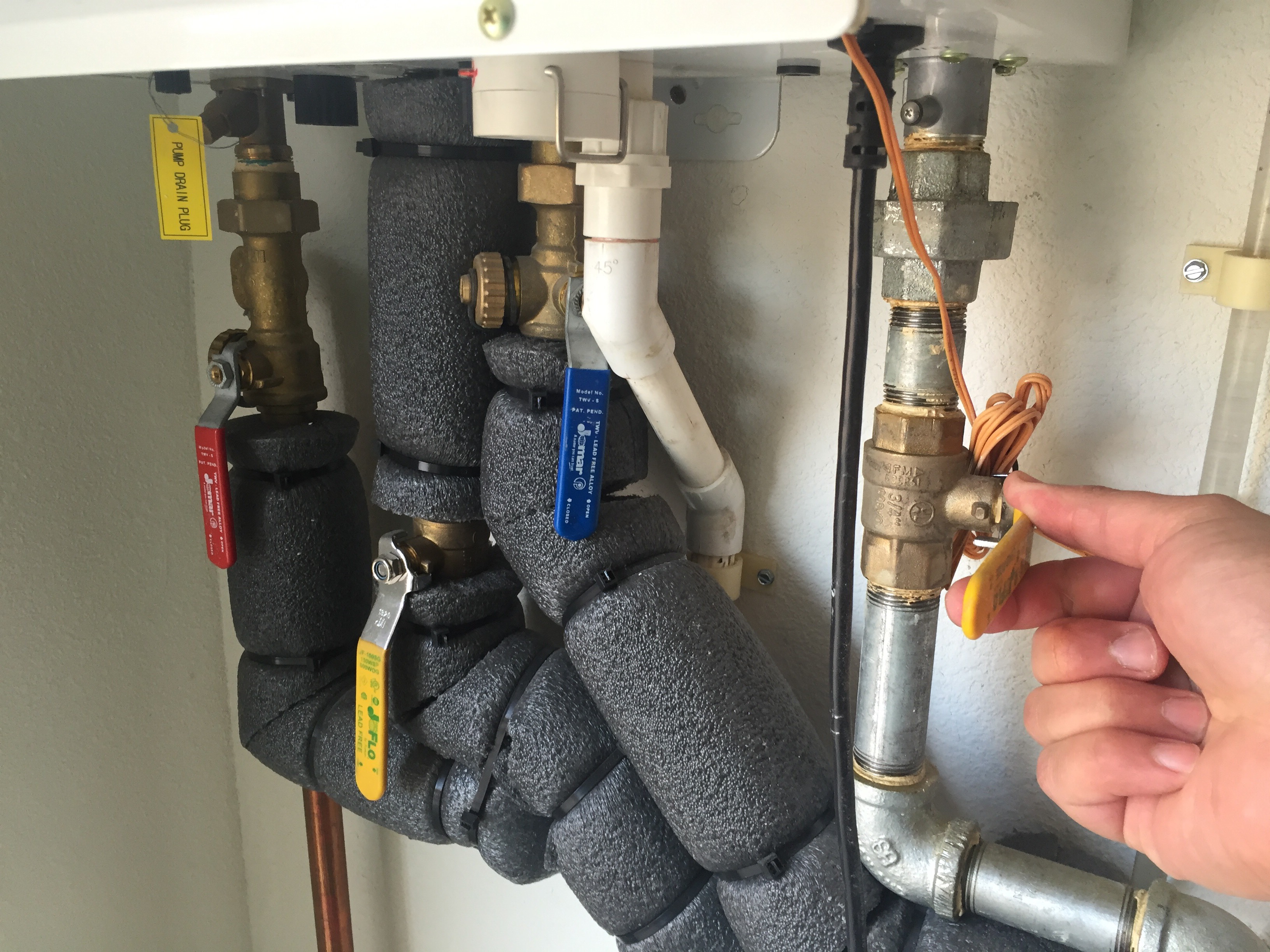 How to Flush a Tankless Water Heater and Clean the Air Intake Filter