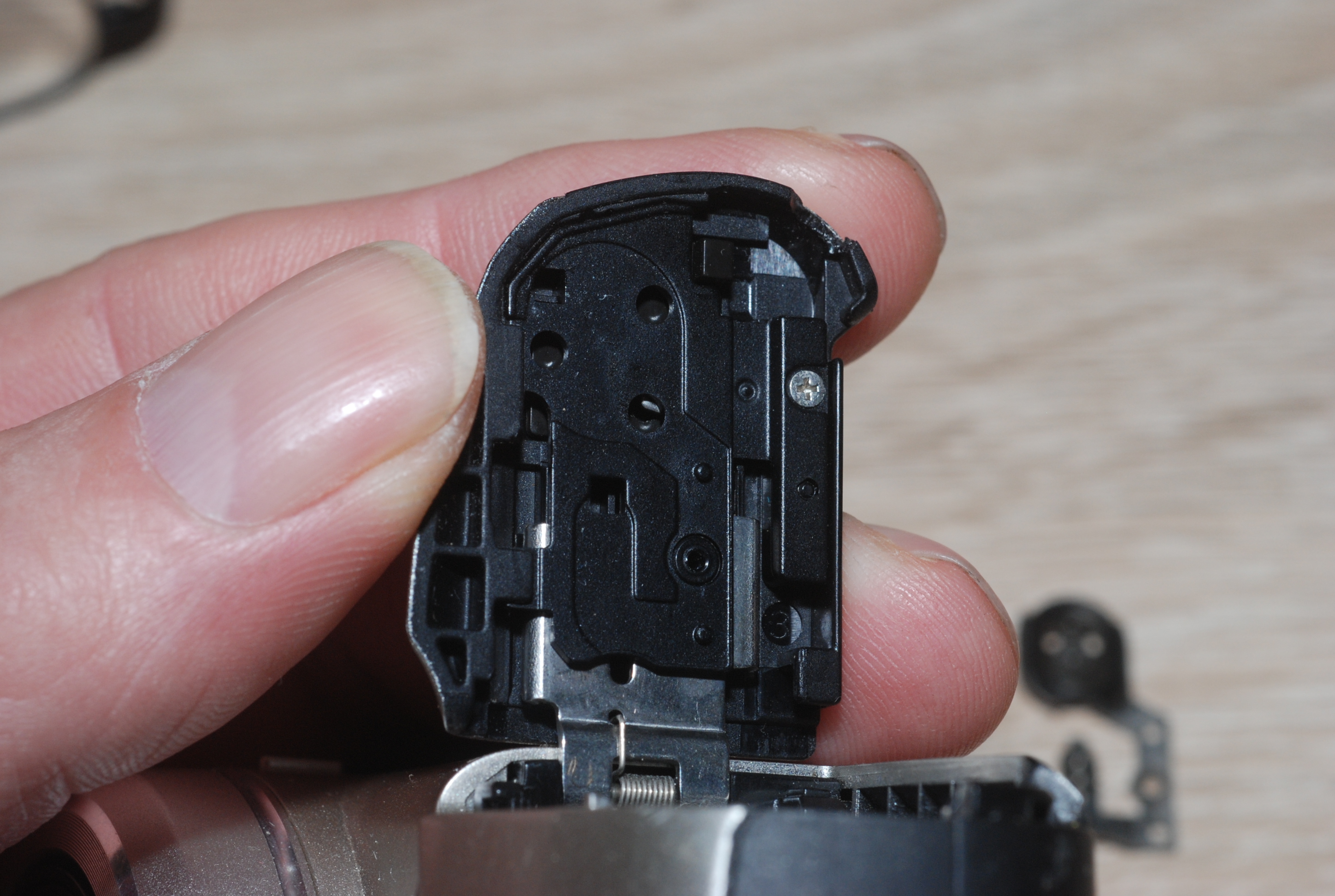 Replacement of Canon PowerShot SX130IS Battery Compartment Door 4