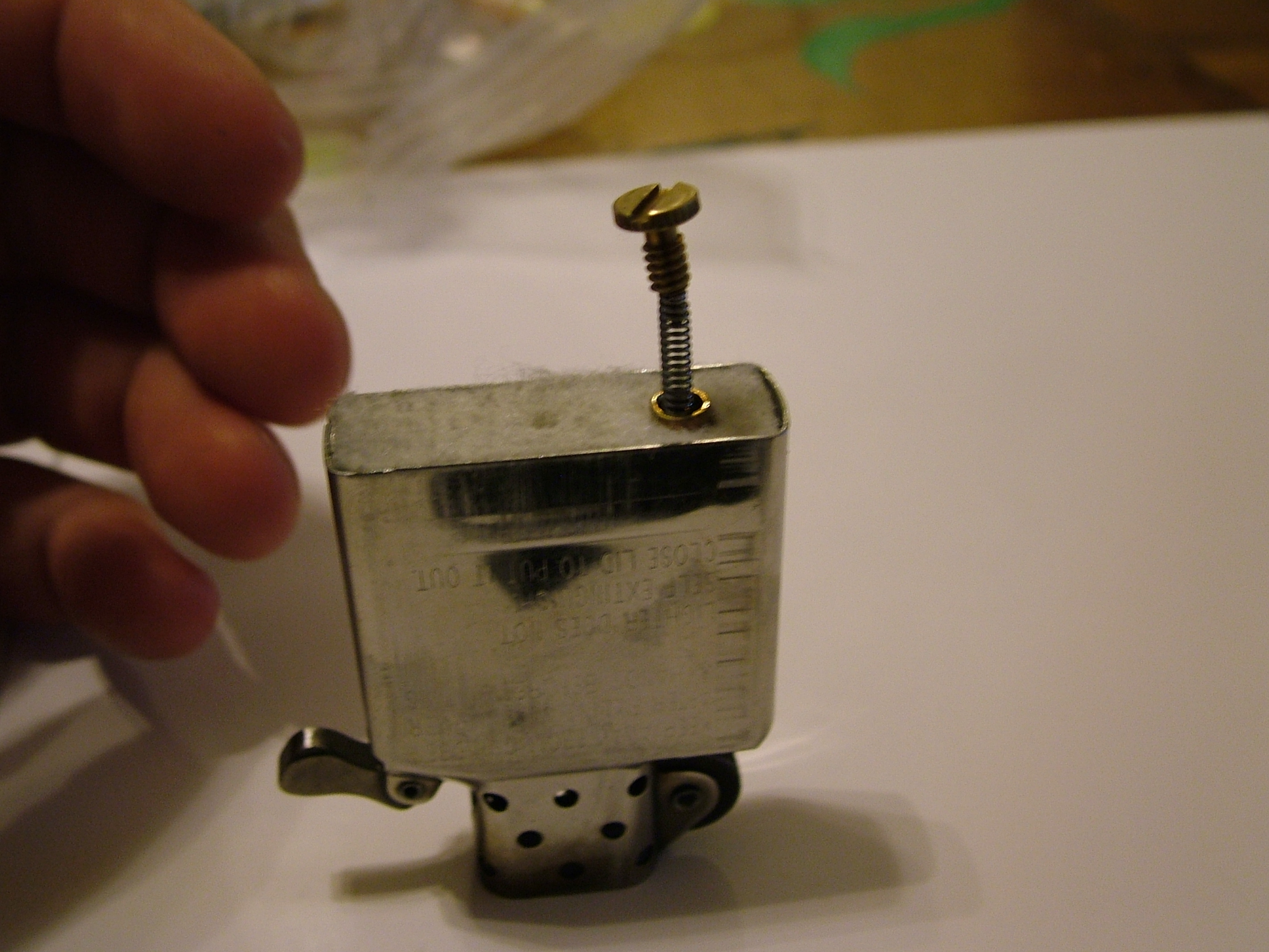 Replace Your Zippo Flint With Flint From a Dead BIC 4 Steps