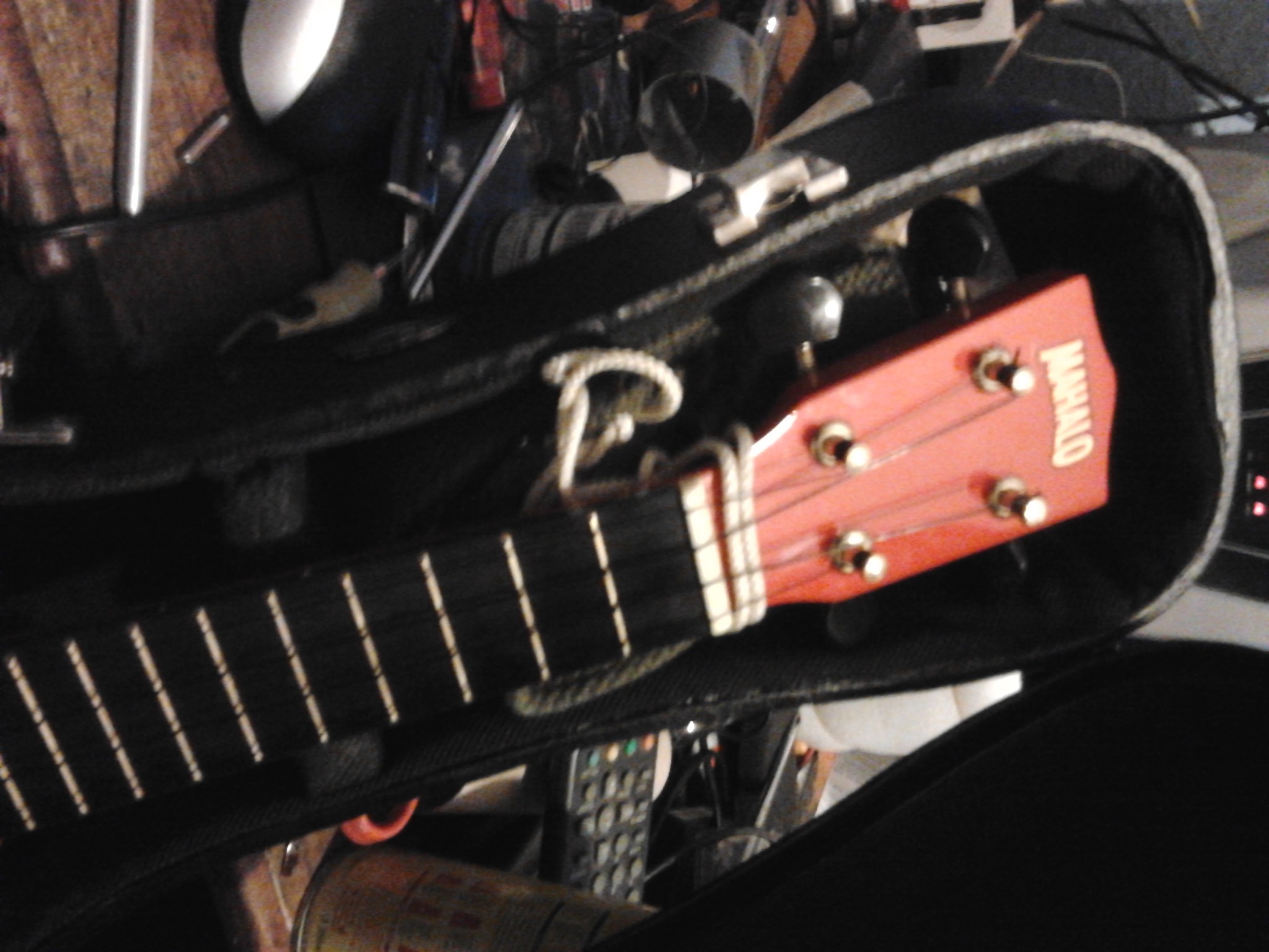 Fit Guitar Strap End Pin Buttons and Gutar Style Strap to a Ukelele. Instructables