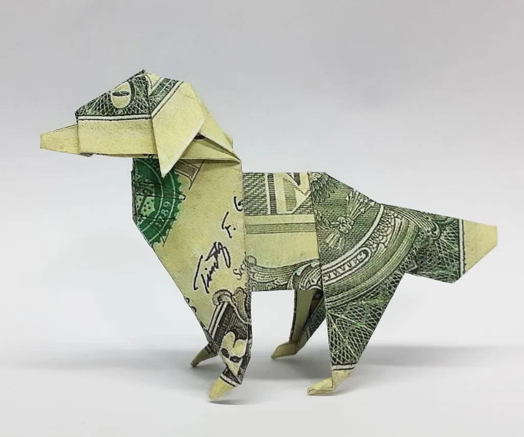 origami dog with money