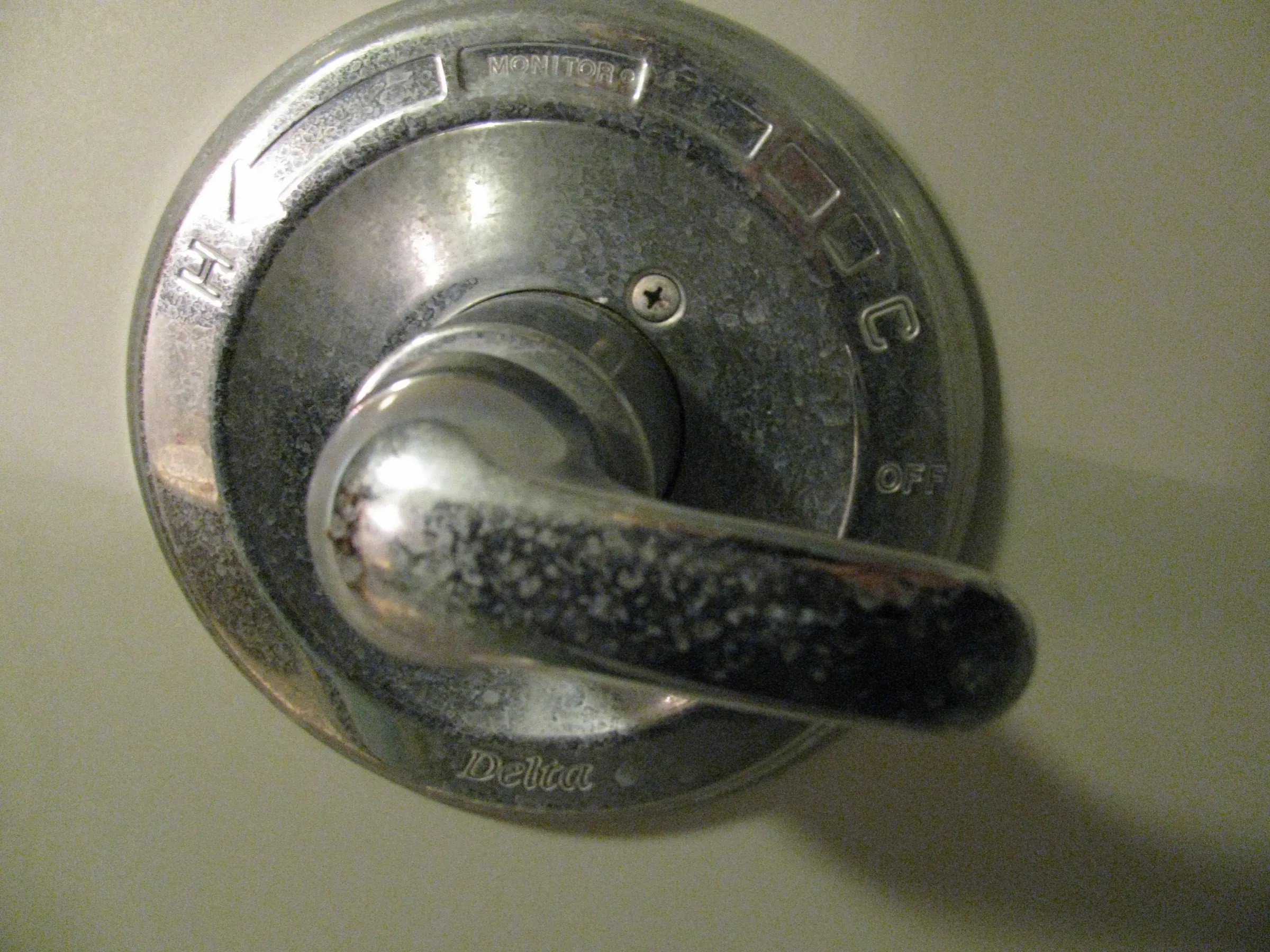 How to Change the Cartridge of a Delta Monitor Shower Valve. 8 Steps