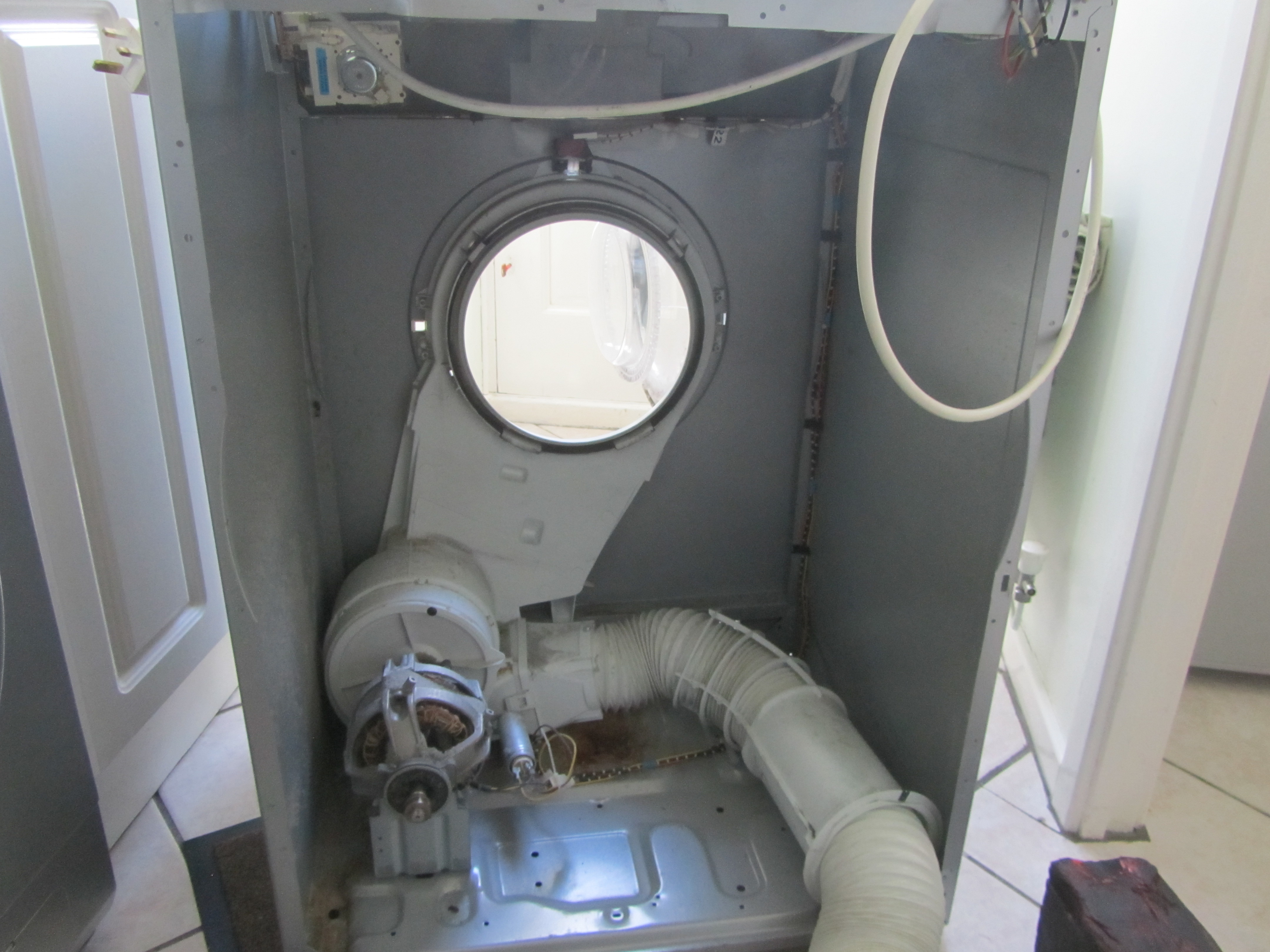 Repairing a Damaged Tumble Dryer Rear Bush Housing 4 Steps (with