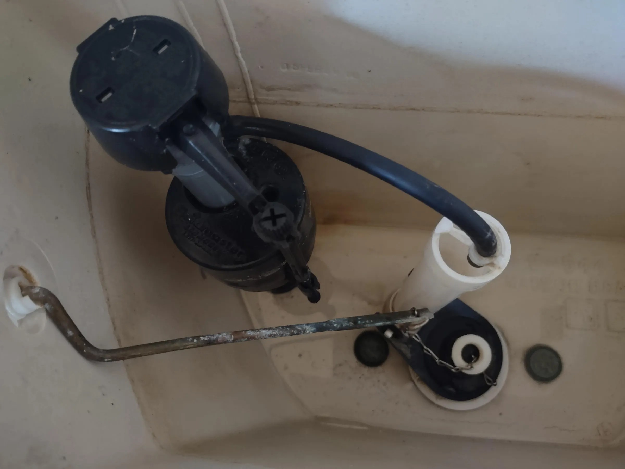 Fix a Toilet Tank Loose Handle, Discolored Water, and High Water Level