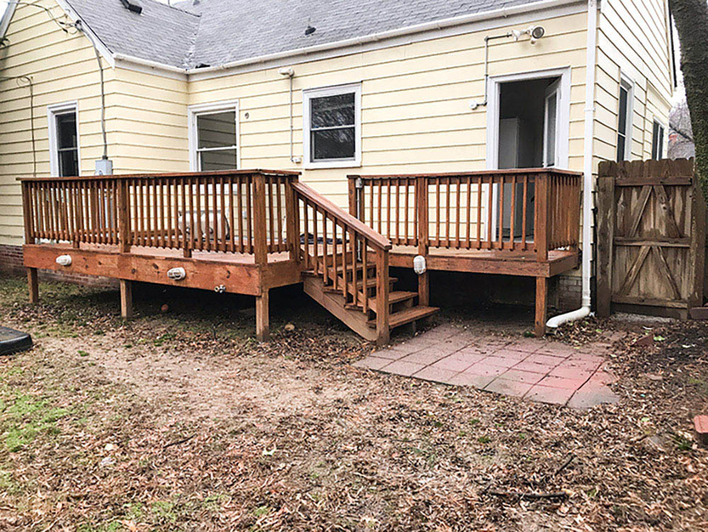 Complement A Floating Deck With Paver Patio Addition The Home Depot Floating Deck With Paver Patio Addition
