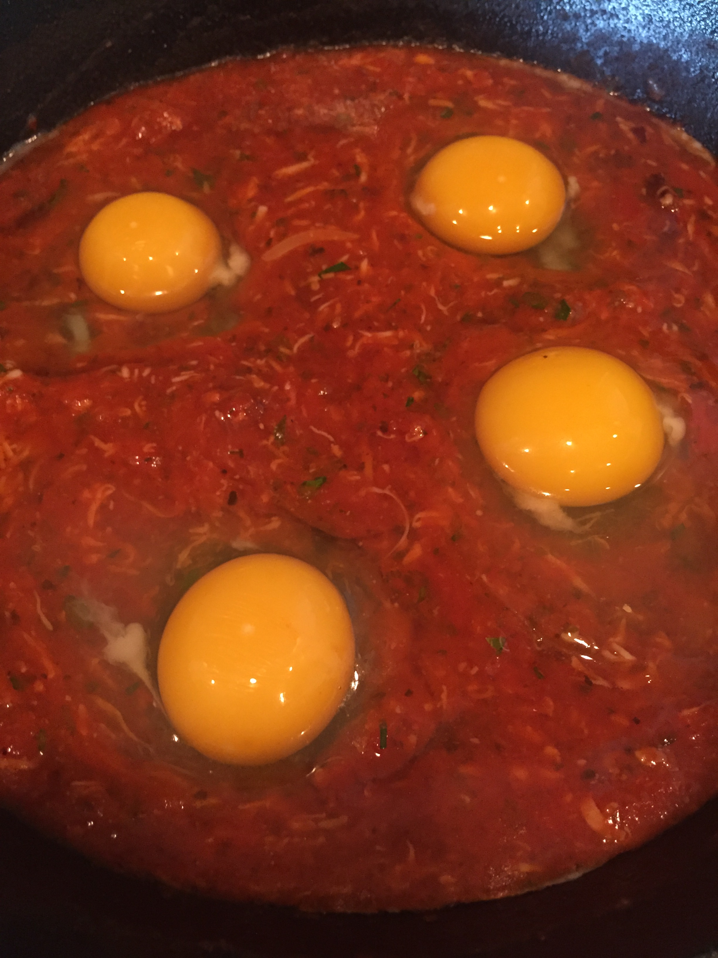 Eggs in Marinara Cooking Past Complacency