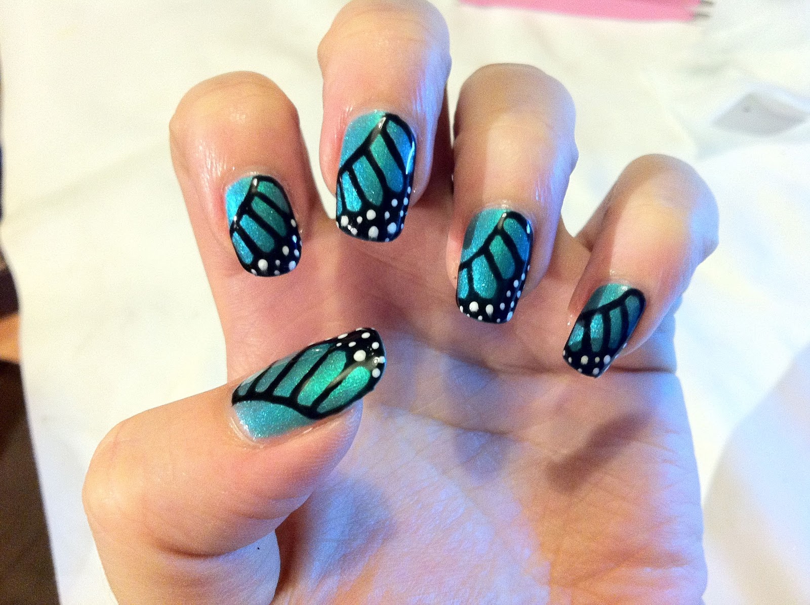 Nails Decorated with Butterflies