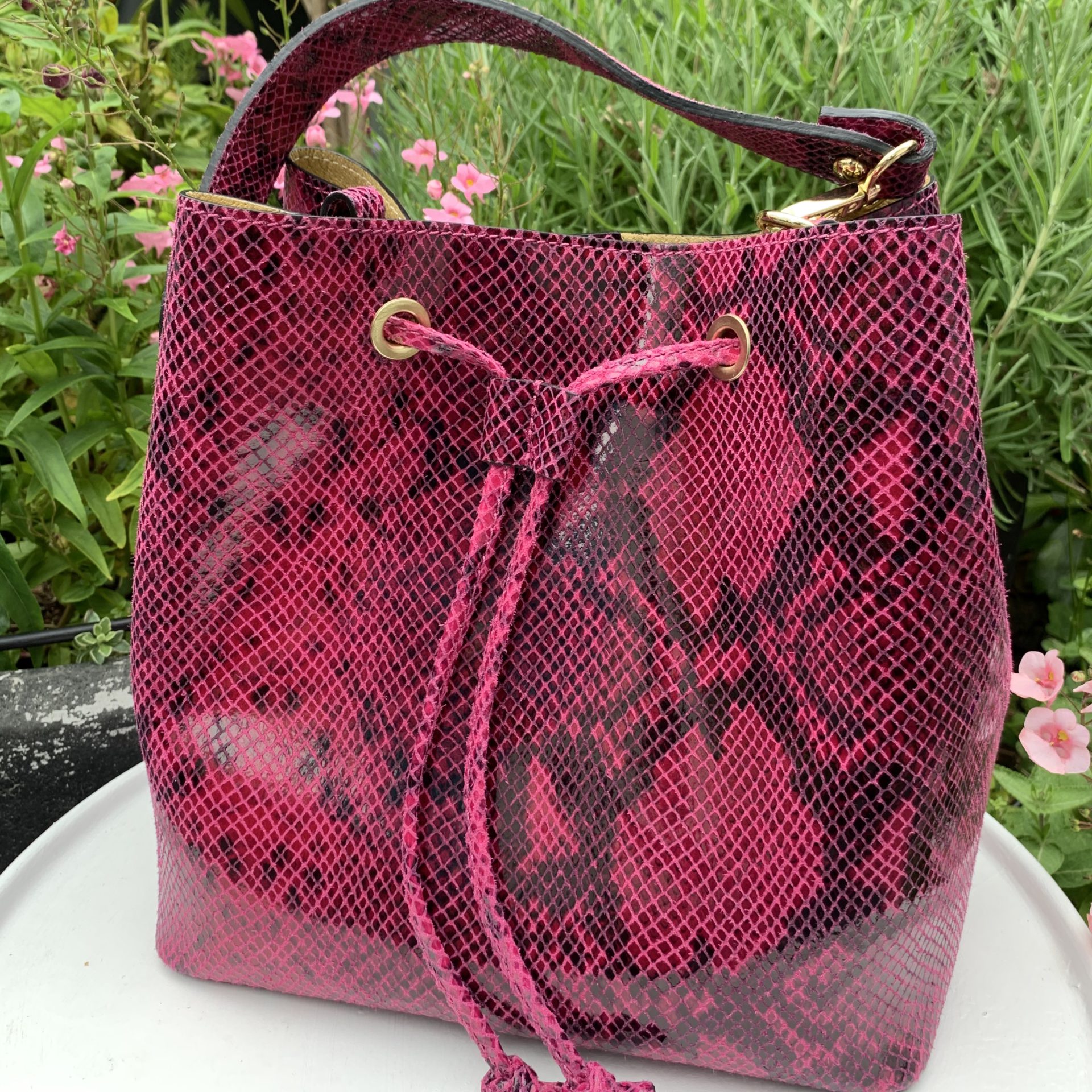 Pink python print leather bucket bag Cornflower Blue Accessories