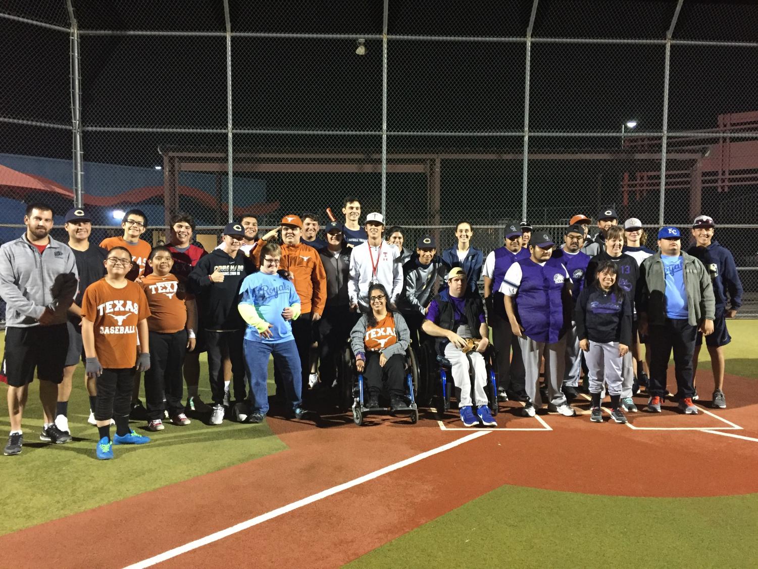 The Explorer Baseball team lends helping hand