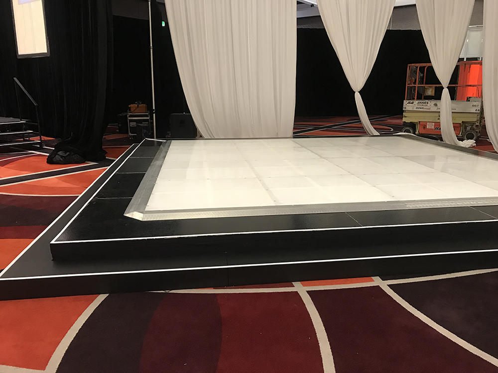 LED dance floor on a raised stage at Crown Perth CorpraHire