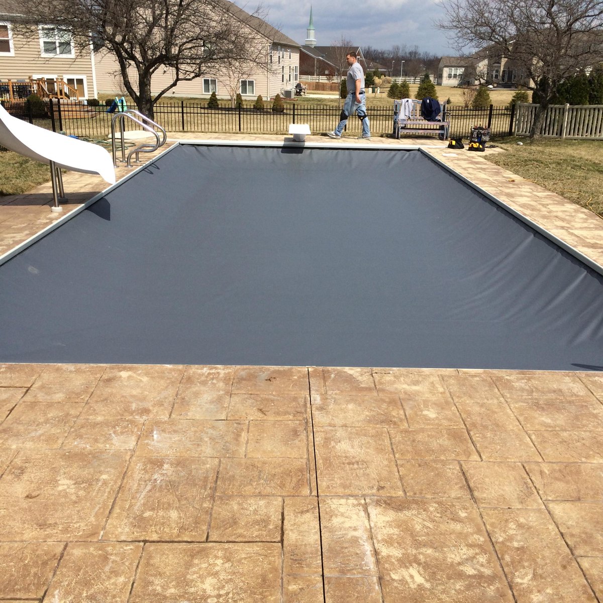 What to do About an Automatic Pool Cover Hole or Tear Cover Care