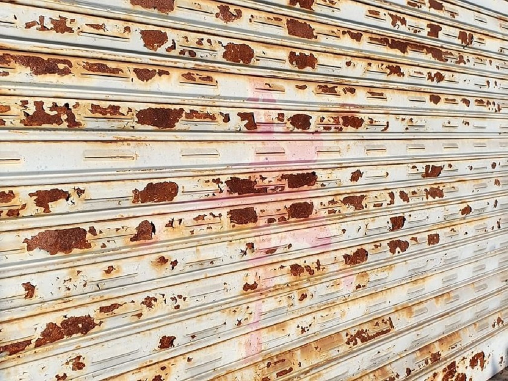 How to Repair Garage Door Rust? Covered Bridge